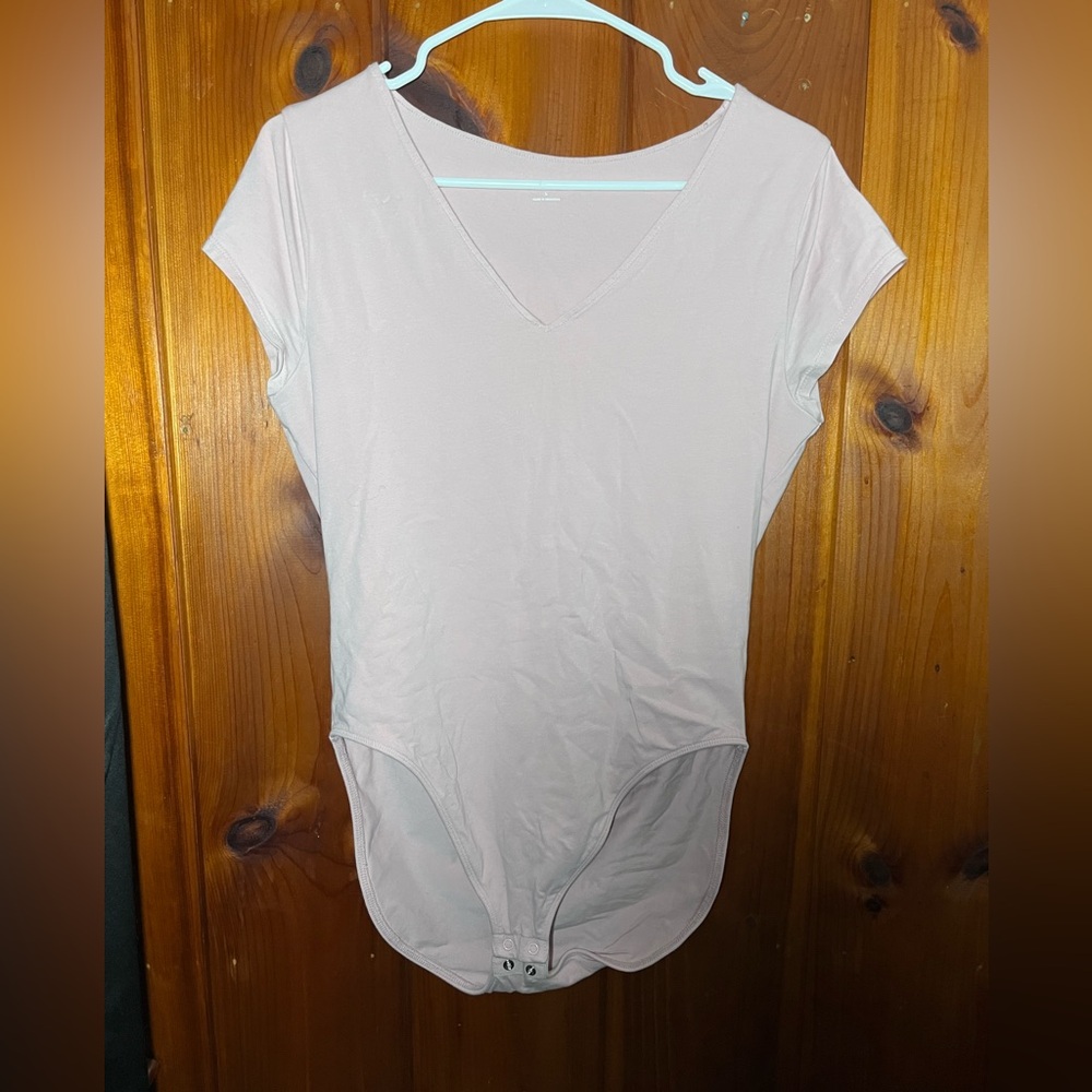 This pink old navy one piece has only been worn once. And is a large